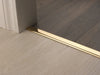 Premier Floating Vinyl Edge — Brass (manufacturer example)